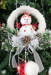 Christmas decoration with snow man on tree
