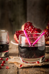 Ripe pomegranates with juice