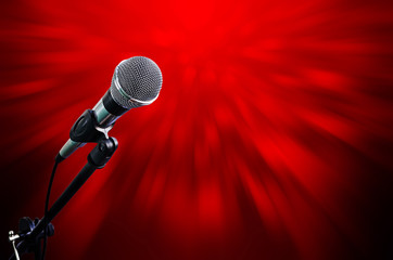 microphone on stage with moving light background