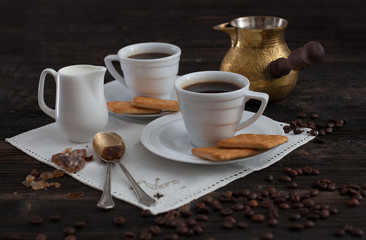coffee cup background with coffee beans and chocolate candies