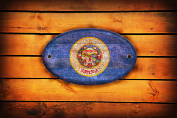 Obraz na płótnie Canvas Wooden Minnesota flag.