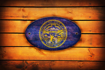 Obraz na płótnie Canvas Wooden Nebraska flag.