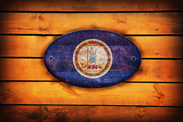 A wooden Virginia flag.