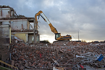 Construction Site Excavator Dismantling a Building