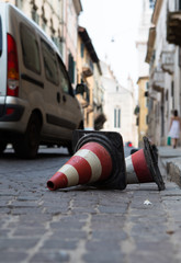 Naklejka na ściany i meble Traffic cones lying on the pitch street