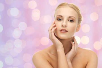 Naklejka premium beautiful young woman face