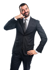 Businessman making phone gesture