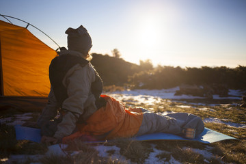 Girl in a sleeping bag.