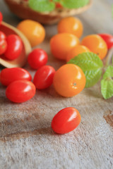 Fototapeta na wymiar fresh tomatoes with mint leaves