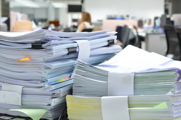 Documents/Stack of documents at workplace.