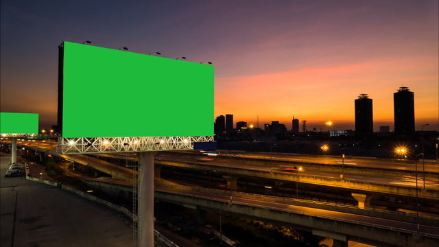 Advertising billboard green screen on sidelines of expressway, time lapse.