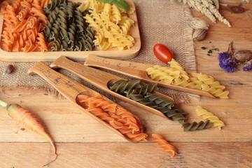 Raw homemade italian pasta colorful for cooking.