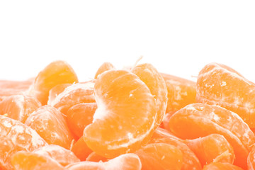 Mandarine slice (heap) on white background