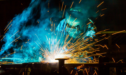 welder Industrial automotive part in factory - obrazy, fototapety, plakaty