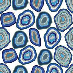 Vector blue agate crystal seamless pattern on white. A slice of geode stone minerals or thunder egg. Indigo blue with gold shimmer streak.