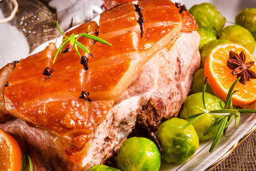Christmas dinner with brussels sprouts in orange sauce