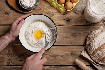 Male baker prepares bread