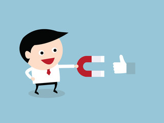Businessman hold magnet attracting like. happy business concept.