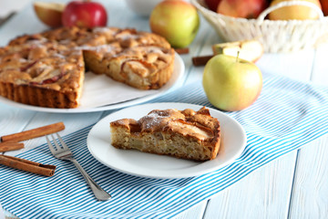Homemade apple cake on blue wooden table
