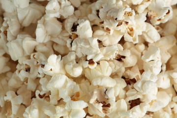 Popcorn in a pile on black background
