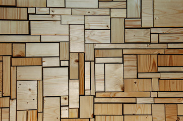 Woodwork and carpentry background with unsanded wooden blocks.