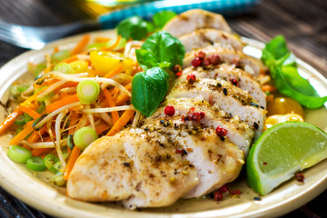 Roasted chicken breast with vegetable, basil and lime
