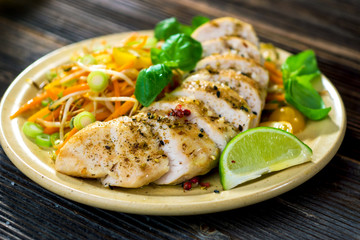 Roasted chicken breast with vegetable, basil and lime
