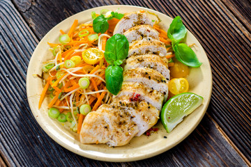 Roasted chicken breast with vegetable, basil and lime
