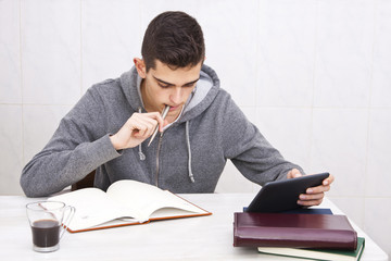 young man studying at home, lifestyle