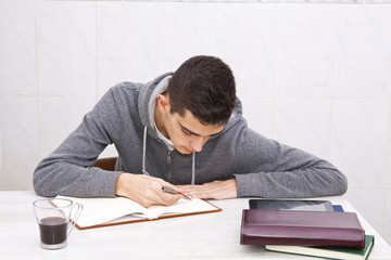 young man studying at home, lifestyle