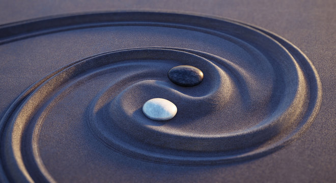 Yin Yang Motiv - Steine in dunklem sand