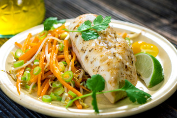 Roasted chicken breast with vegetable, coriander and lime