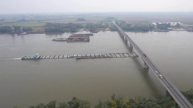 Aerial view on huge tanker ship moving on the river Danube.
