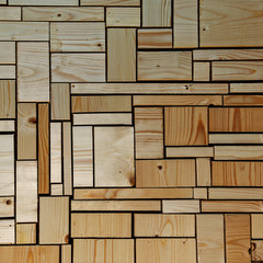Woodwork and carpentry background with unsanded wooden blocks.