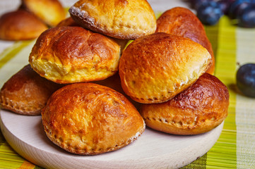 Baked dumplings with plum stuffing