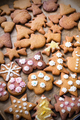 Colorful Christmas gingerbread cookies on  baking paper