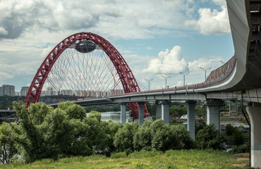  picturesque bridge on background cloudy sky