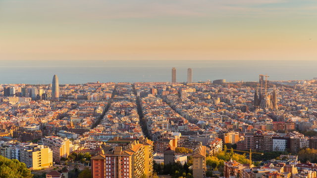 Barcelona holy grail day to night 4K time lapse passing from day to golden hour, blue hour and night.