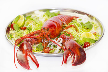 lobster on a plate with a lemon lime restaurant