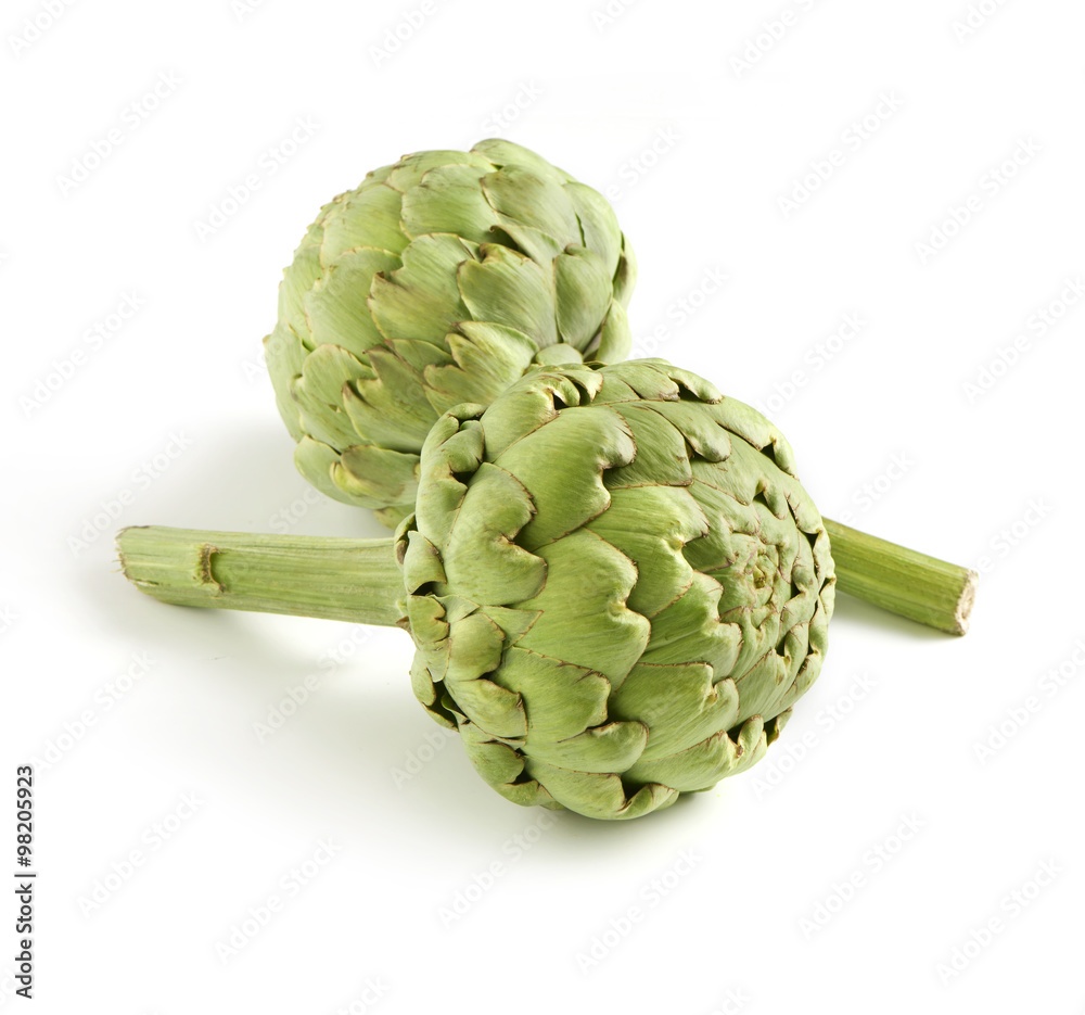 Wall mural fresh globe artichokes on white background