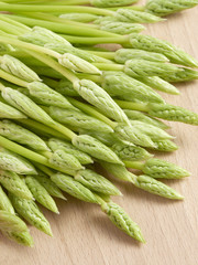 Fresh Asparagus Spears on Wooden Background