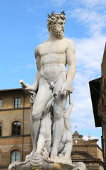 Fototapeta premium White statue of Neptune in the ancient fountain in Florence