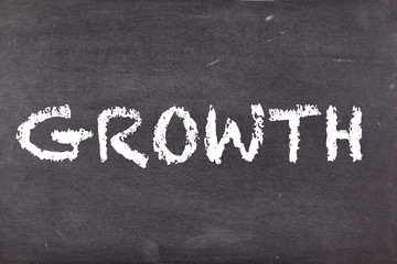 Growth, concept on school blackboard or chalkboard