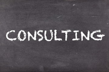 Fototapeta premium Consulting, concept on school blackboard or chalkboard