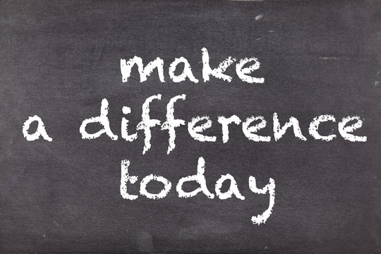 Make a difference today, concept on school blackboard or chalkbo