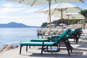 loungers and sunshades at the beach