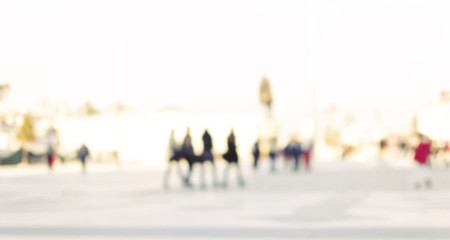 City commuters. High key blurred image of people walking in the