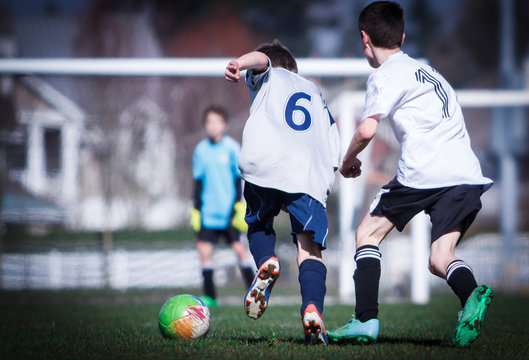 Boys playing soccer