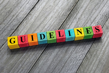 Fototapeta guidelines text on colorful wooden cubes obraz
