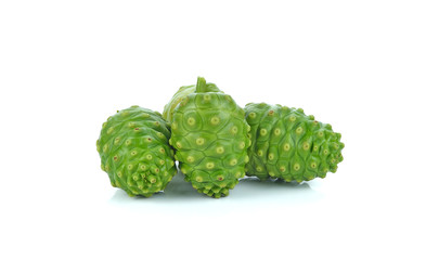 Noni fruits on white background